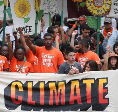 Image:youth march, from climate action network. Topic: Climate and Environmental Justice
