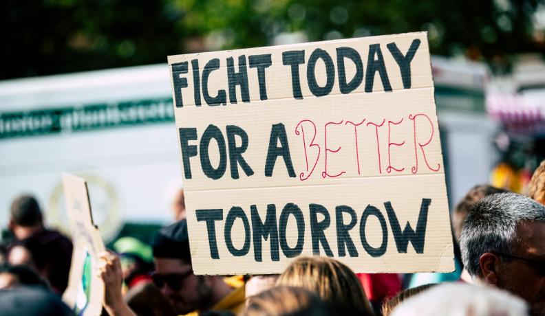 A protest poster that reads "Fight Today for A Better Tomorrow"