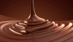 pouring delicious fair trade direct trade chocolate into a pile