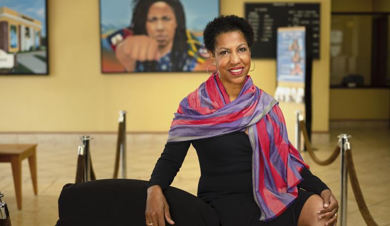 Teri Williams wearing a pink scarf