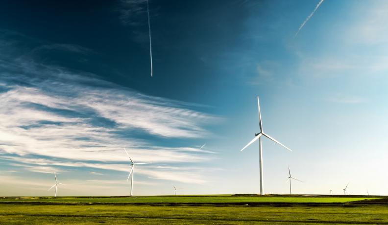 Image: windmills in field. Topic:10 Ways You Can Fight Climate Change