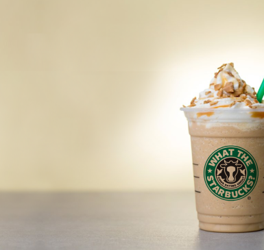 Image: iced frappucino in a cup that says What the Starbucks?
