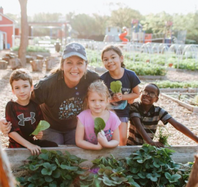 Farmer Kim Aman and Moss Haven Elementary Farm students 