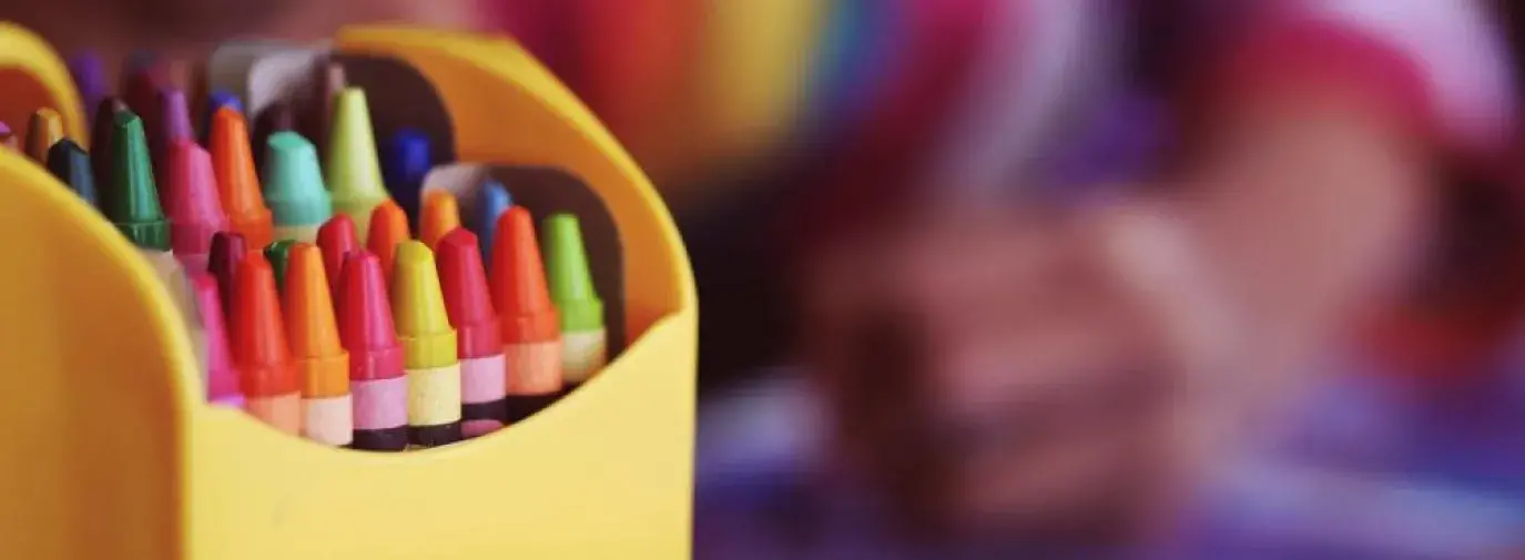 Image: brightly colored box of crayons. Title: 5 Everyday Products that May Have Lurking Asbestos
