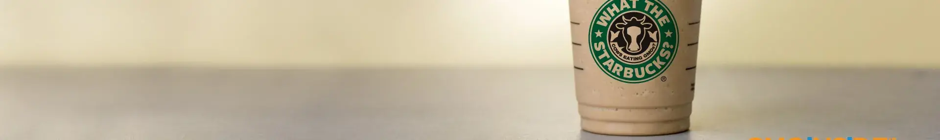 Image: iced frappucino in a cup that says What the Starbucks?