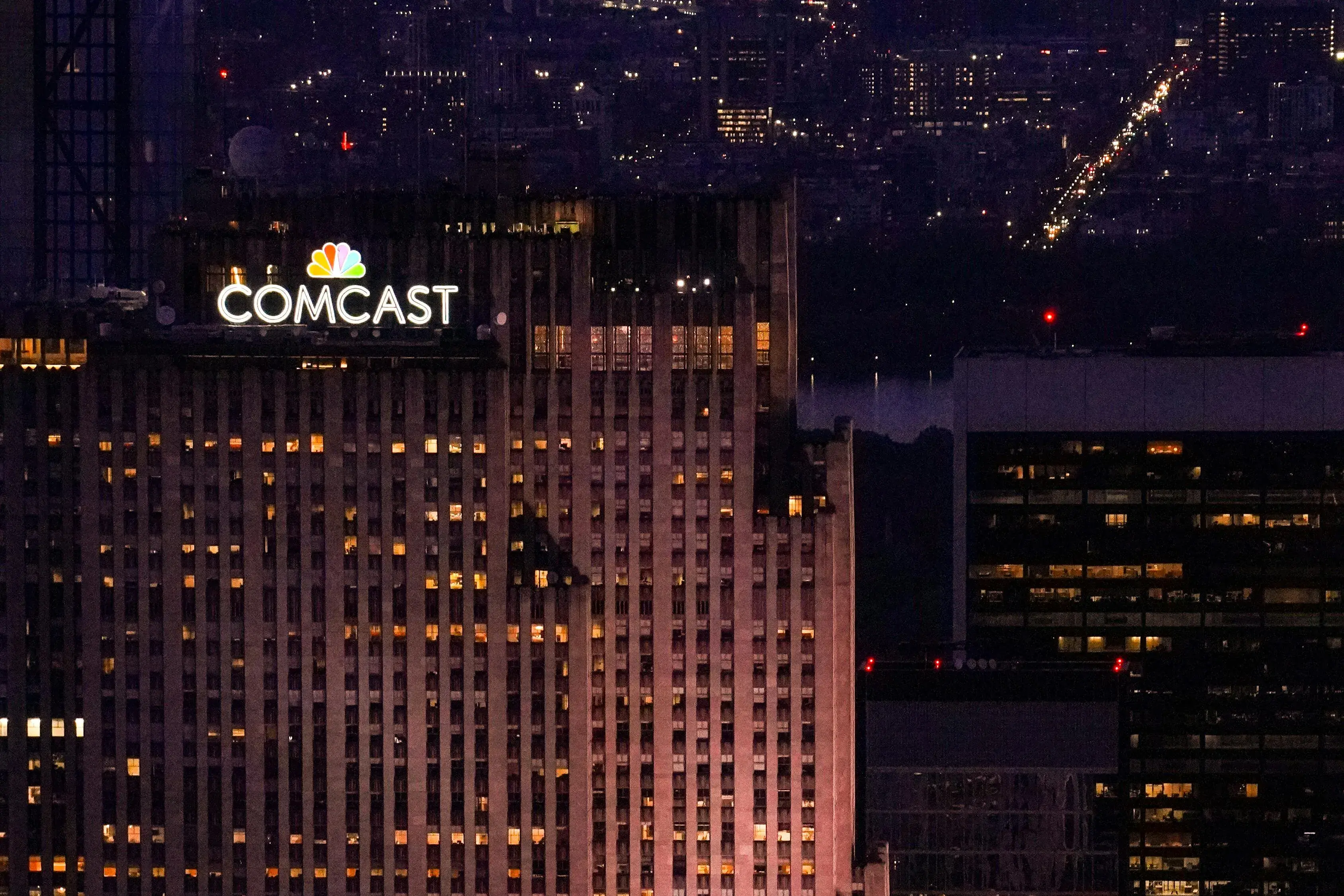 Comcast headquarters in Manhattan at night.